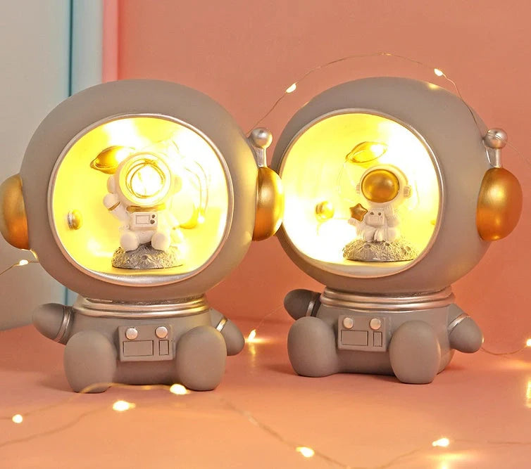 Astronaut-themed LED night light piggy bank with hand-painted resin craft