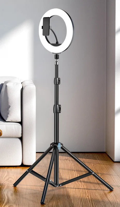 Carbon steel mobile phone tripod extended to full height with a 10-inch lamp attached and phone mounted.