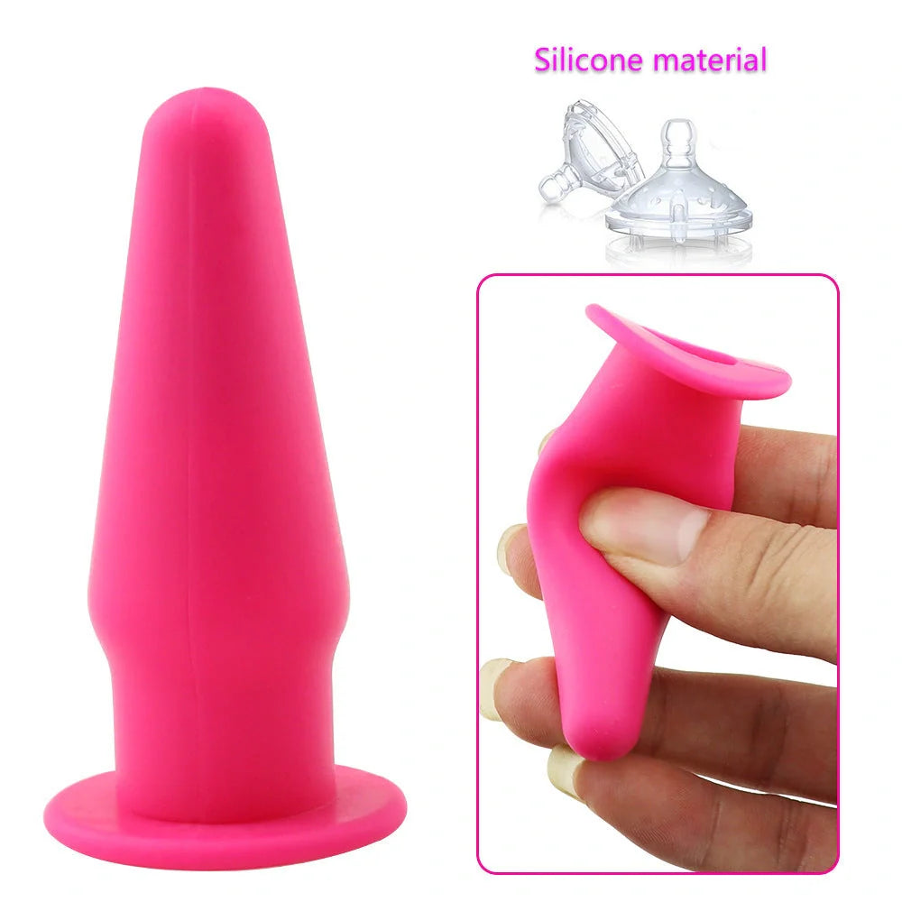 Premium silicone vibrating anal plug for G-spot stimulation in rose red, black, or purple.