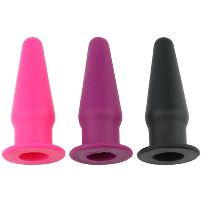 Premium silicone vibrating anal plug for G-spot stimulation in rose red, black, or purple.