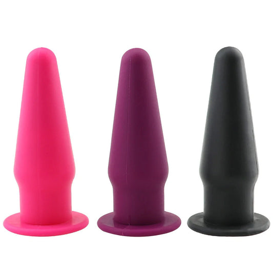Premium silicone vibrating anal plug for G-spot stimulation in rose red, black, or purple.