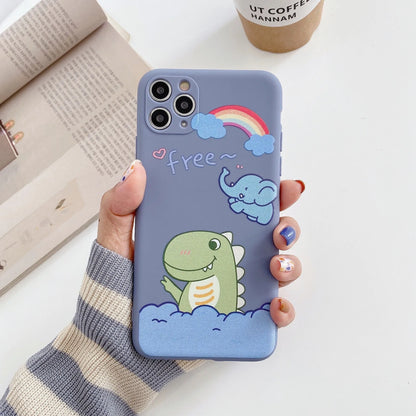 Blue frosted TPU iPhone case with a cartoon dinosaur print next to a pink case with a cat girl print.