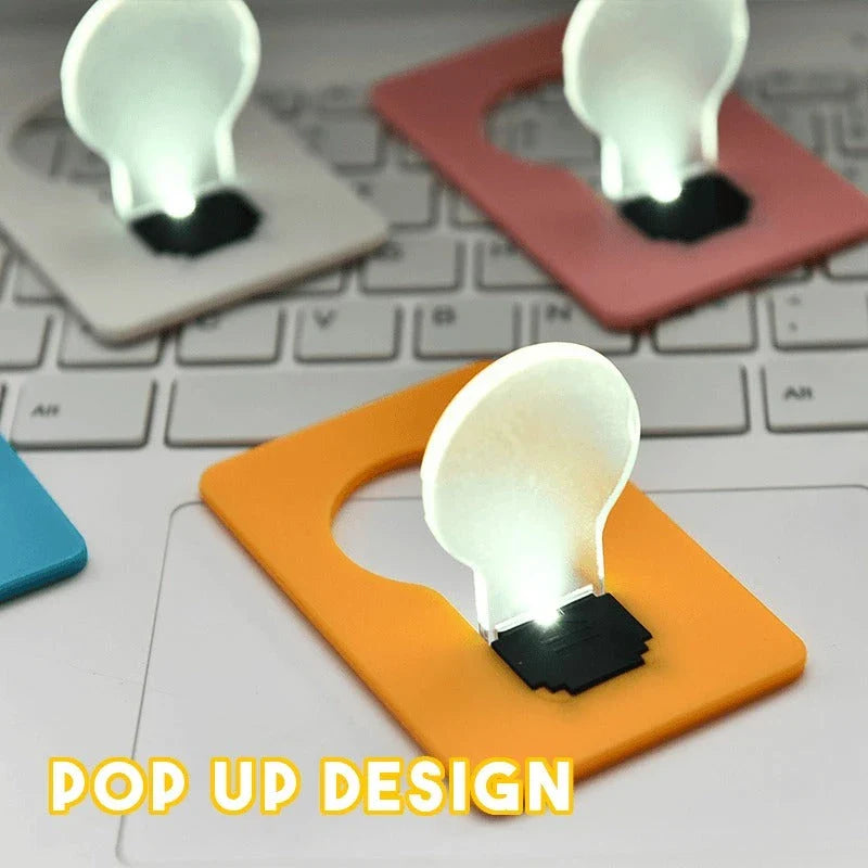 Compact, folding LED lamp with credit card-sized design for portable illumination in emergencies and everyday use
