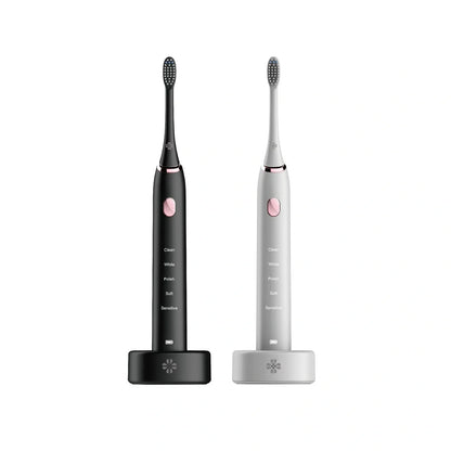 White waterproof electric toothbrush with inductive charging base and 5 nursing mode settings