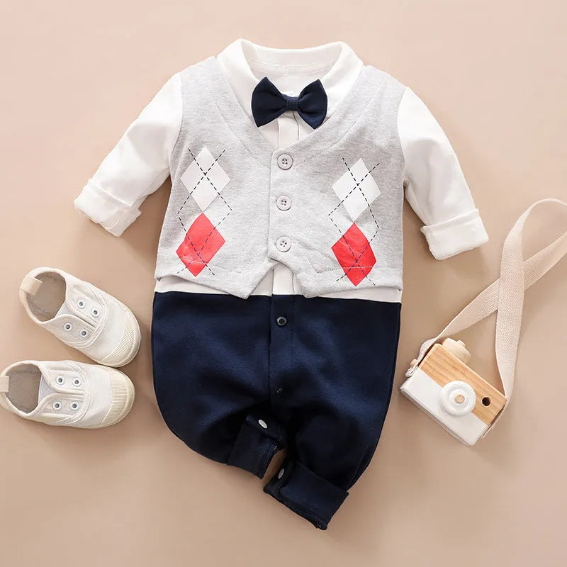 Baby boy in a navy blue long-sleeved cotton jumpsuit with a gentleman-style collar.