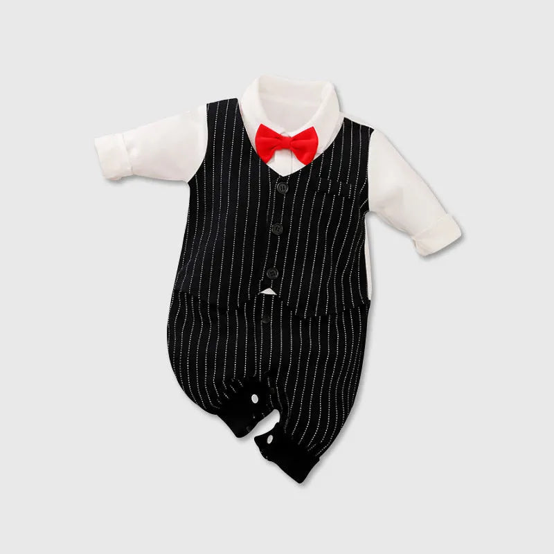 Baby boy in a navy blue long-sleeved cotton jumpsuit with a gentleman-style collar.