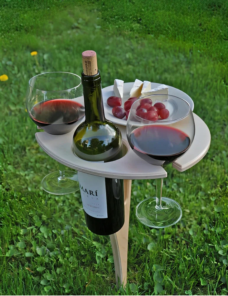Folding wooden wine table with bottle holder, two glass slots and serving plate section