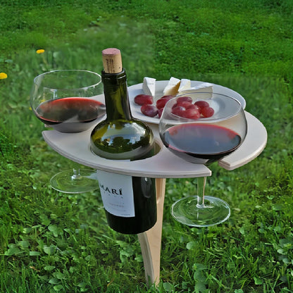 Folding wooden wine table with bottle holder, two glass slots and serving plate section