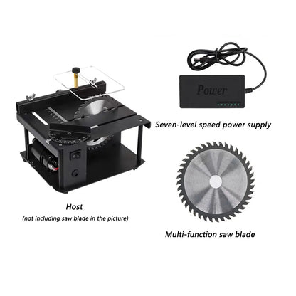 Black miniature precision table saw on a workbench with sliding table and 110mm blade.