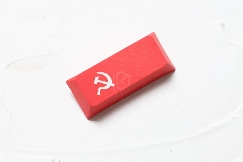 Close-up of black thick PBT keycap with dye-sublimated Japanese Root font legend