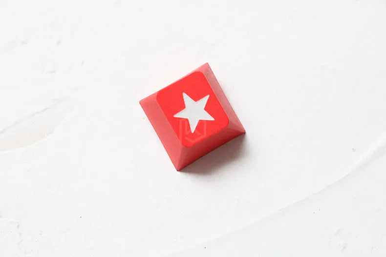 Close-up of black thick PBT keycap with dye-sublimated Japanese Root font legend