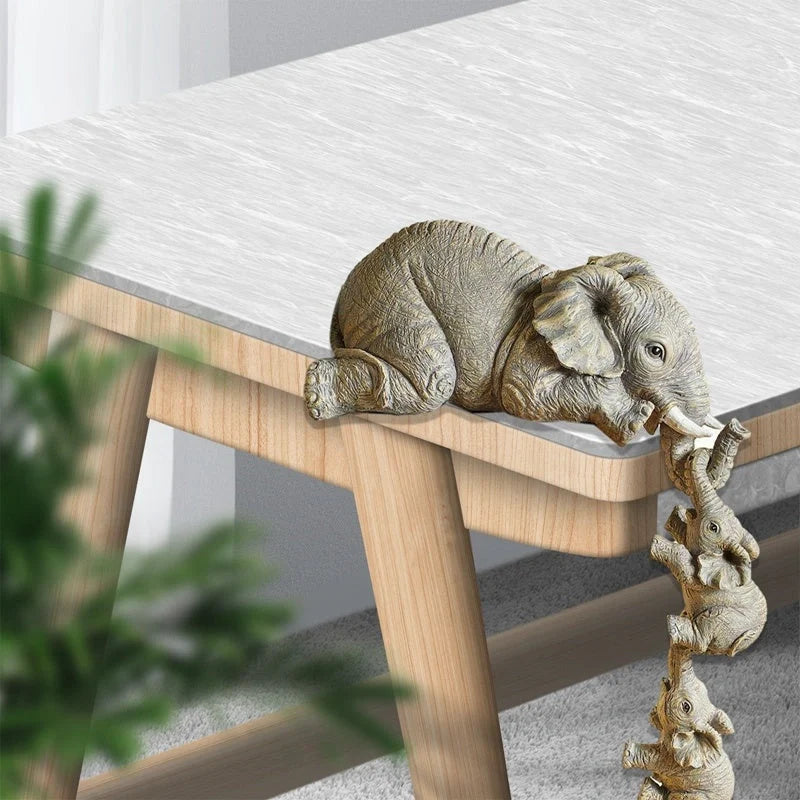 Handcrafted resin mother and baby elephant ornament symbolising love, perfect for home decor or gifts.