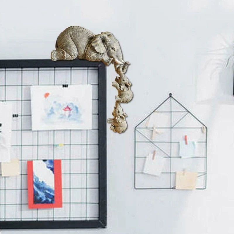 Handcrafted resin mother and baby elephant ornament symbolising love, perfect for home decor or gifts.