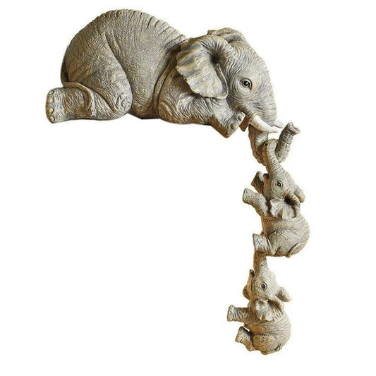 Handcrafted resin mother and baby elephant ornament symbolising love, perfect for home decor or gifts.