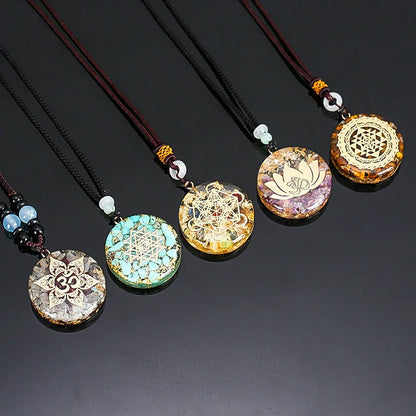 A handcrafted seven chakra pendant necklace made with crushed turquoise, designed to promote positive energy and spiritual alignment.