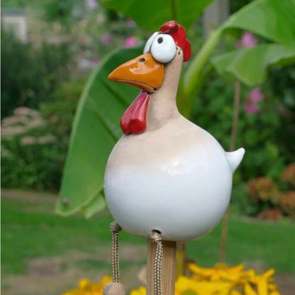 Charming hen and rooster ornaments made of durable resin with vibrant colours and intricate details for elegant garden decor