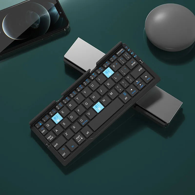 Silver aluminium folding Bluetooth keyboard with phone stand showing open and closed positions