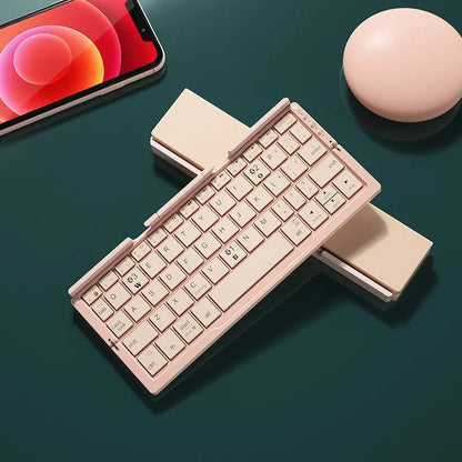 Silver aluminium folding Bluetooth keyboard with phone stand showing open and closed positions