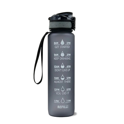 Blue and red gradient 1 litre Tritan sports water bottle with time markers and a flip-top lid.