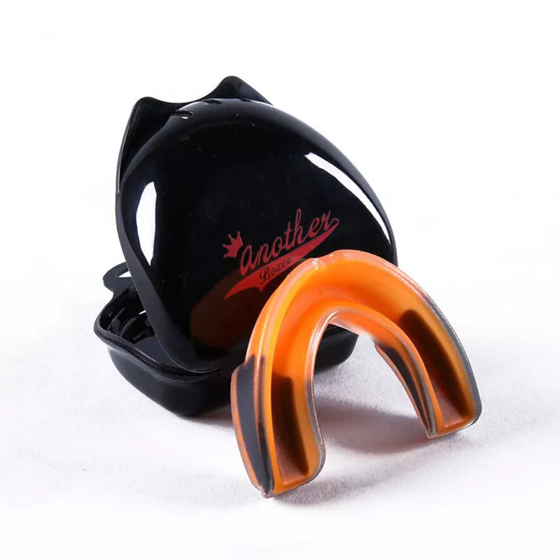 Double-sided silicone mouth guard for basketball and boxing, available in multiple colors and sizes.