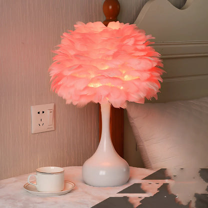 Feather table lamp with hand-woven fur shade and iron base showing adjustable lighting controls