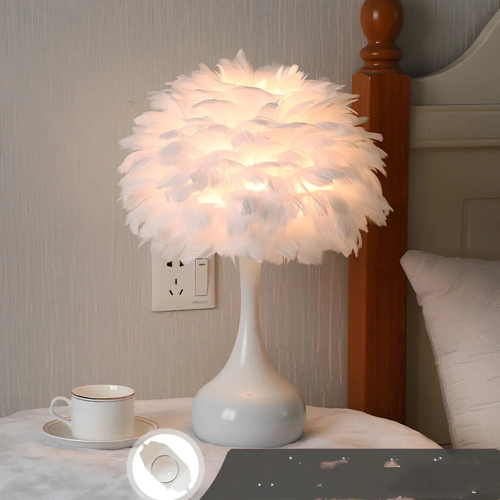 Feather table lamp with hand-woven fur shade and iron base showing adjustable lighting controls