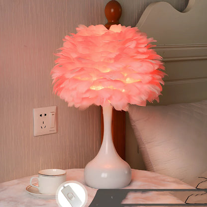 Feather table lamp with hand-woven fur shade and iron base showing adjustable lighting controls