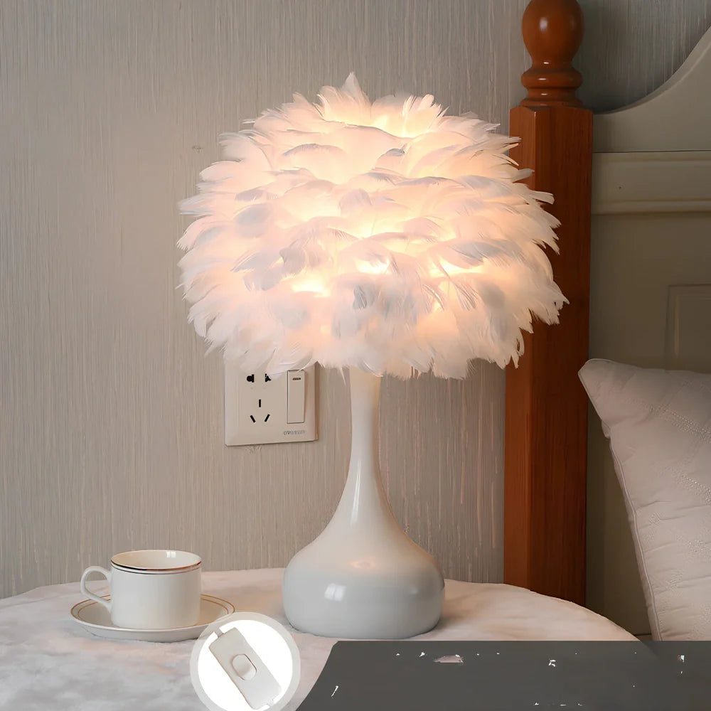 Feather table lamp with hand-woven fur shade and iron base showing adjustable lighting controls