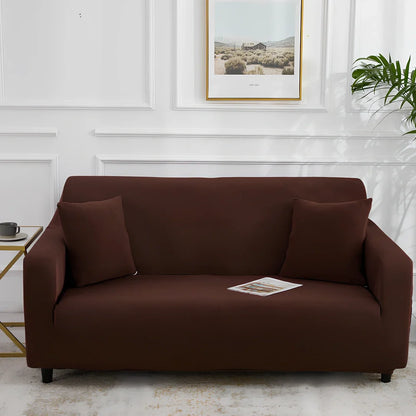 Universal stretch sofa cover on modular sofa showing 360-degree coverage and elastic edging