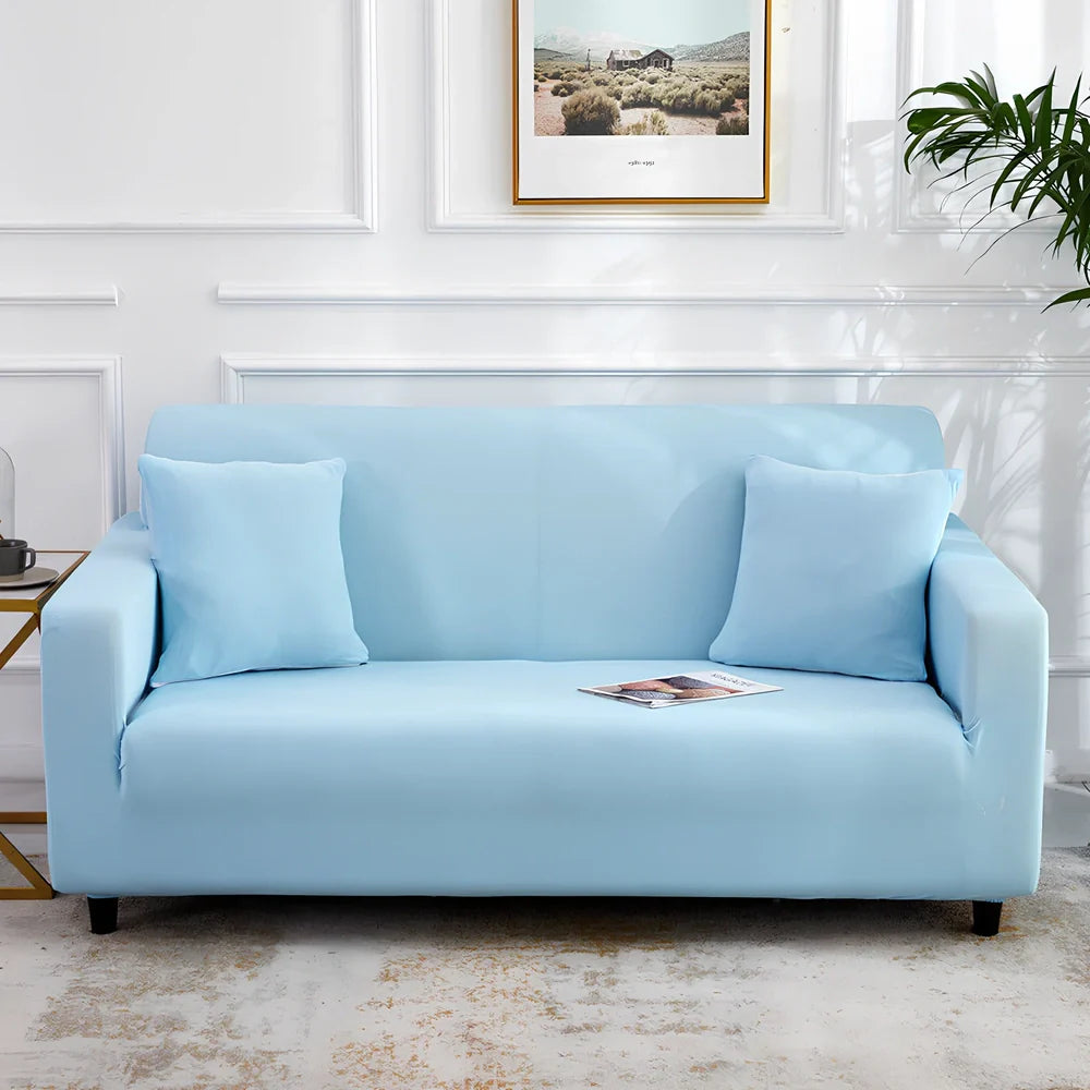 Universal stretch sofa cover on modular sofa showing 360-degree coverage and elastic edging