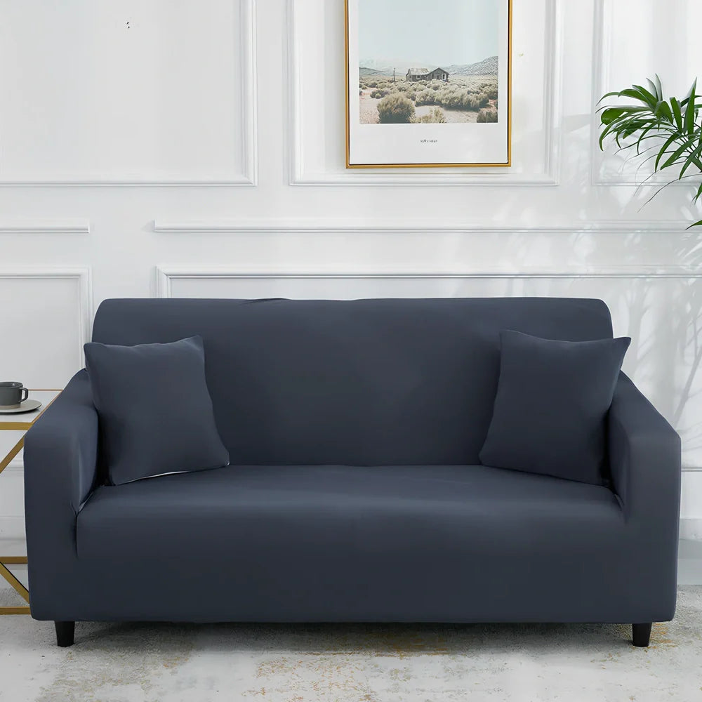 Universal stretch sofa cover on modular sofa showing 360-degree coverage and elastic edging