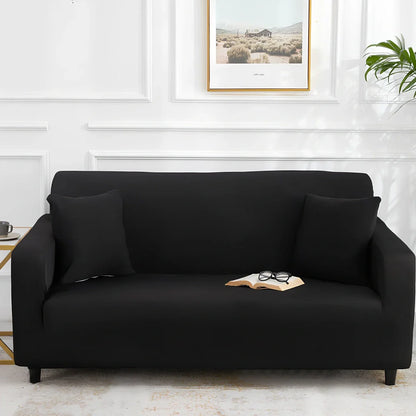 Universal stretch sofa cover on modular sofa showing 360-degree coverage and elastic edging