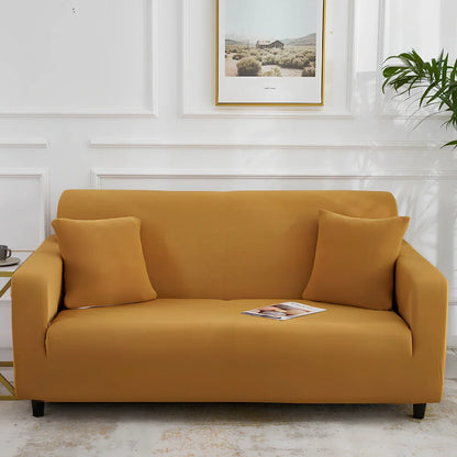 Universal stretch sofa cover on modular sofa showing 360-degree coverage and elastic edging