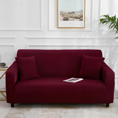 Universal stretch sofa cover on modular sofa showing 360-degree coverage and elastic edging