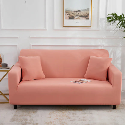 Universal stretch sofa cover on modular sofa showing 360-degree coverage and elastic edging