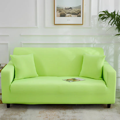 Universal stretch sofa cover on modular sofa showing 360-degree coverage and elastic edging