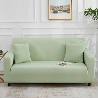 Universal stretch sofa cover on modular sofa showing 360-degree coverage and elastic edging