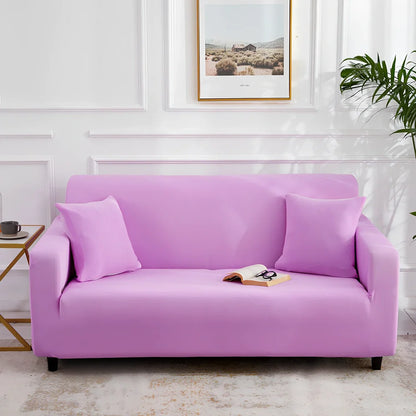Universal stretch sofa cover on modular sofa showing 360-degree coverage and elastic edging