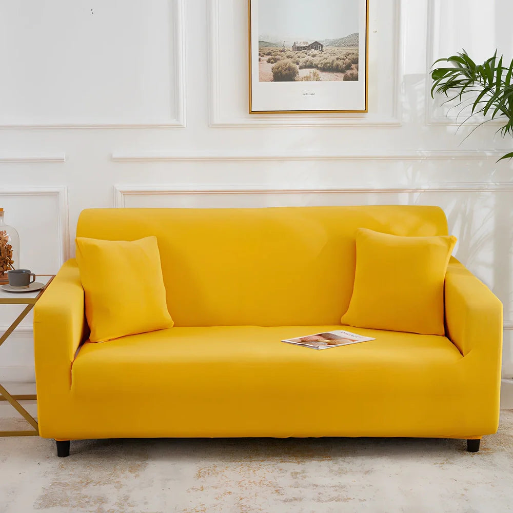 Universal stretch sofa cover on modular sofa showing 360-degree coverage and elastic edging