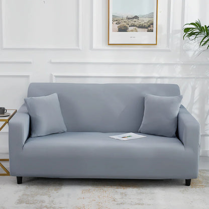 Universal stretch sofa cover on modular sofa showing 360-degree coverage and elastic edging