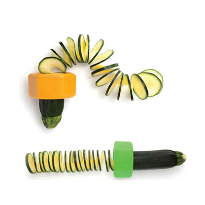 Yellow and green kitchen vegetable cutter creating cucumber spirals with food-grade ABS plastic construction