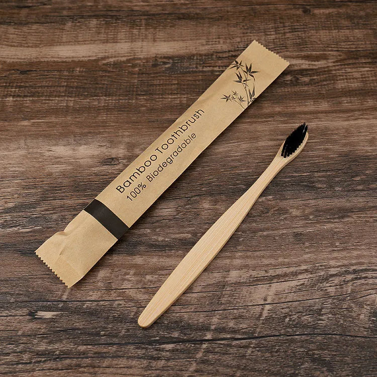 10 natural bamboo toothbrushes with charcoal bristles in six colours showing 17.5cm length