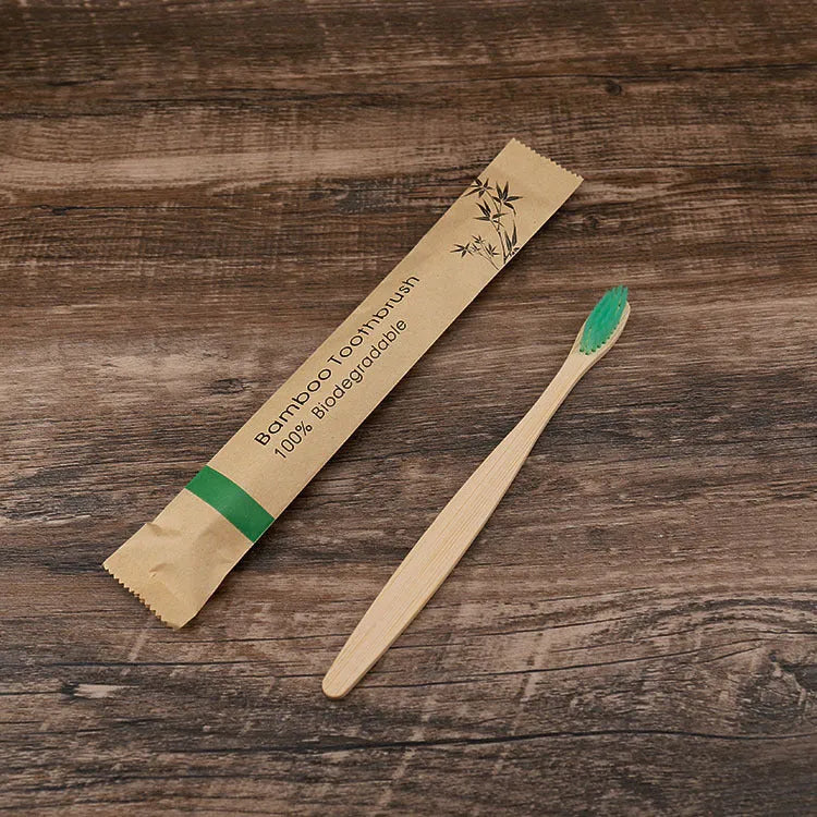 10 natural bamboo toothbrushes with charcoal bristles in six colours showing 17.5cm length