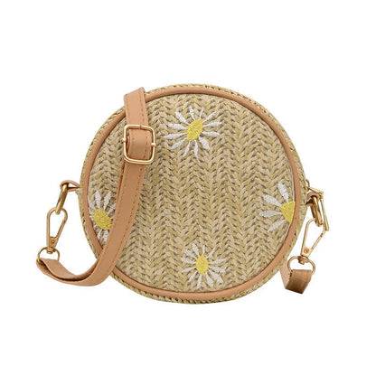 Straw woven small round bag with embroidered detail and smooth zipper