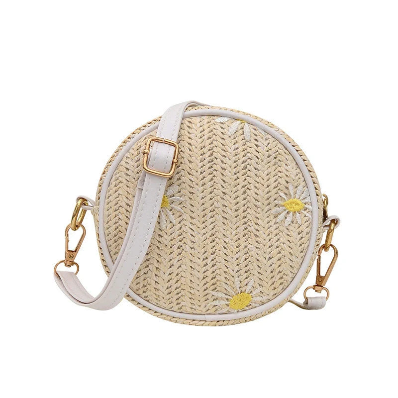 Straw woven small round bag with embroidered detail and smooth zipper