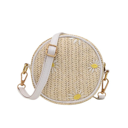 Straw woven small round bag with embroidered detail and smooth zipper