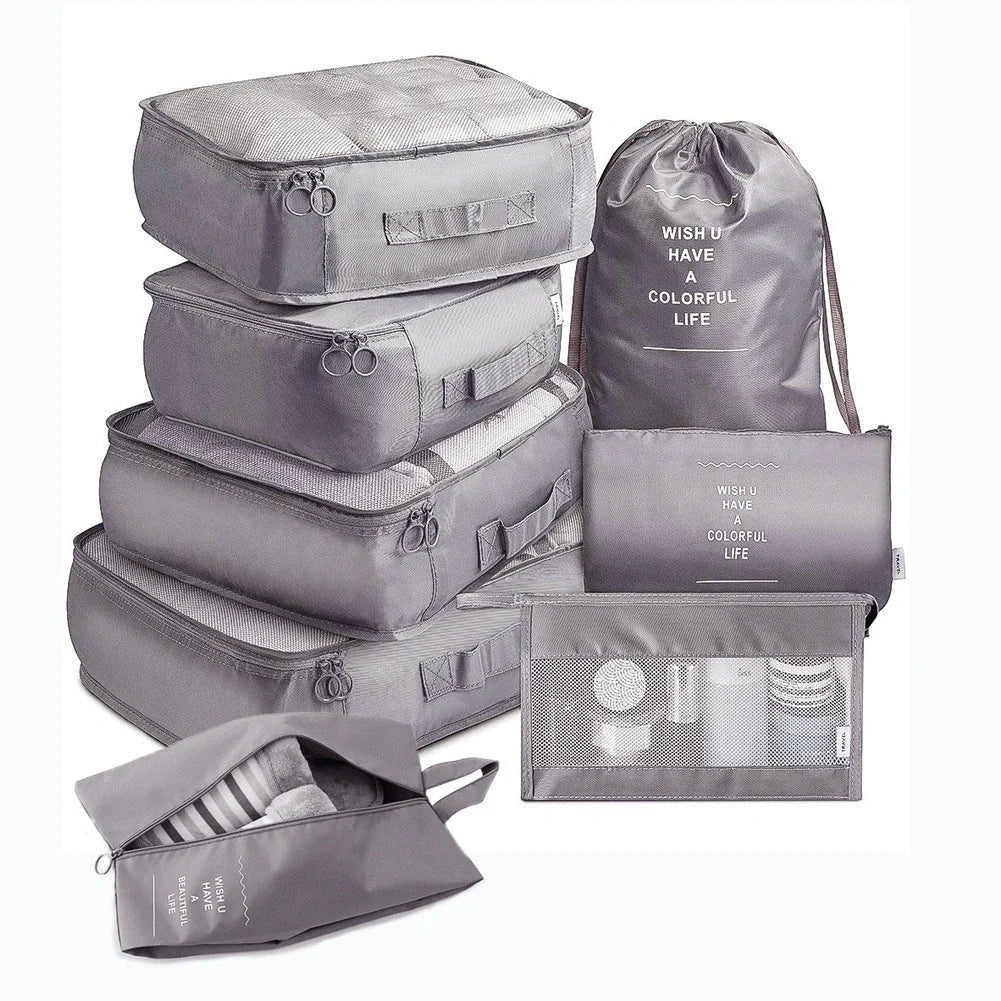 8-piece set of travel packing organisers in various colours for efficient luggage packing