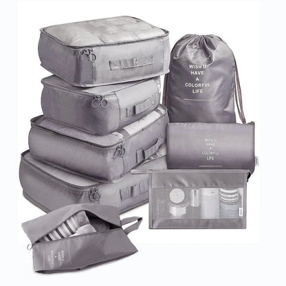 8-piece set of travel packing organisers in various colours for efficient luggage packing