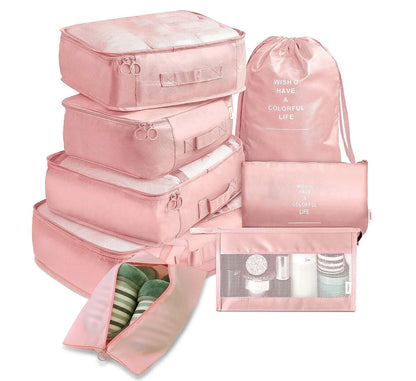 8-piece set of travel packing organisers in various colours for efficient luggage packing