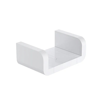 White plastic bathroom storage shelf mounted with suction cups on a tiled wall.